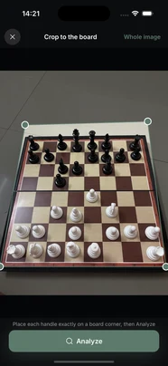 A photo of a real, angled wooden chessboard captured in ChessCopilot